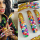 Illustration for article titled Check Out M.I.A.s Insanely Elaborate Nail Art
